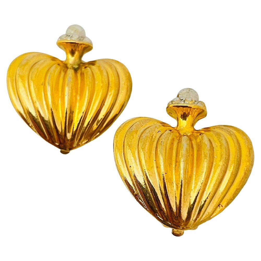 Vintage gold silver designer runway clip on earrings